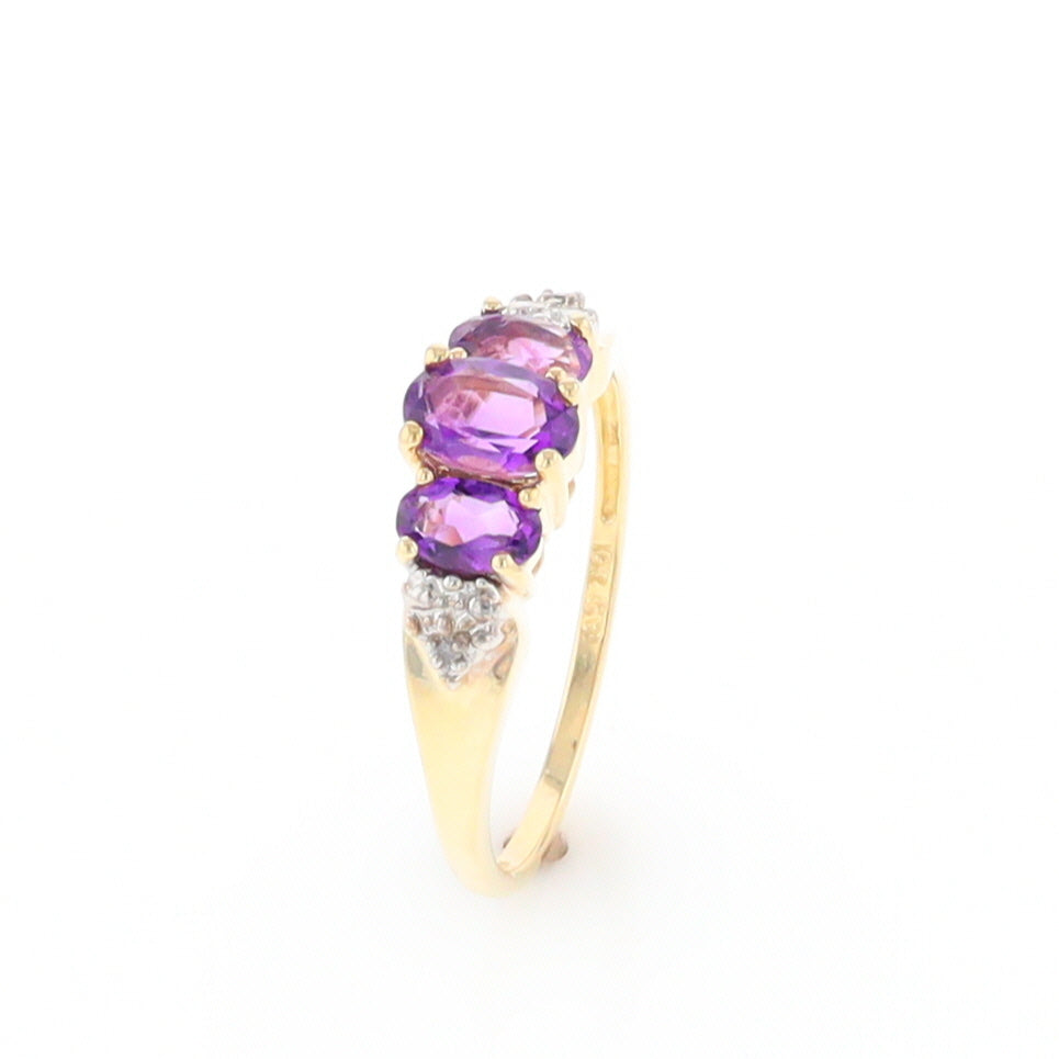 Three stone ring with amethyst