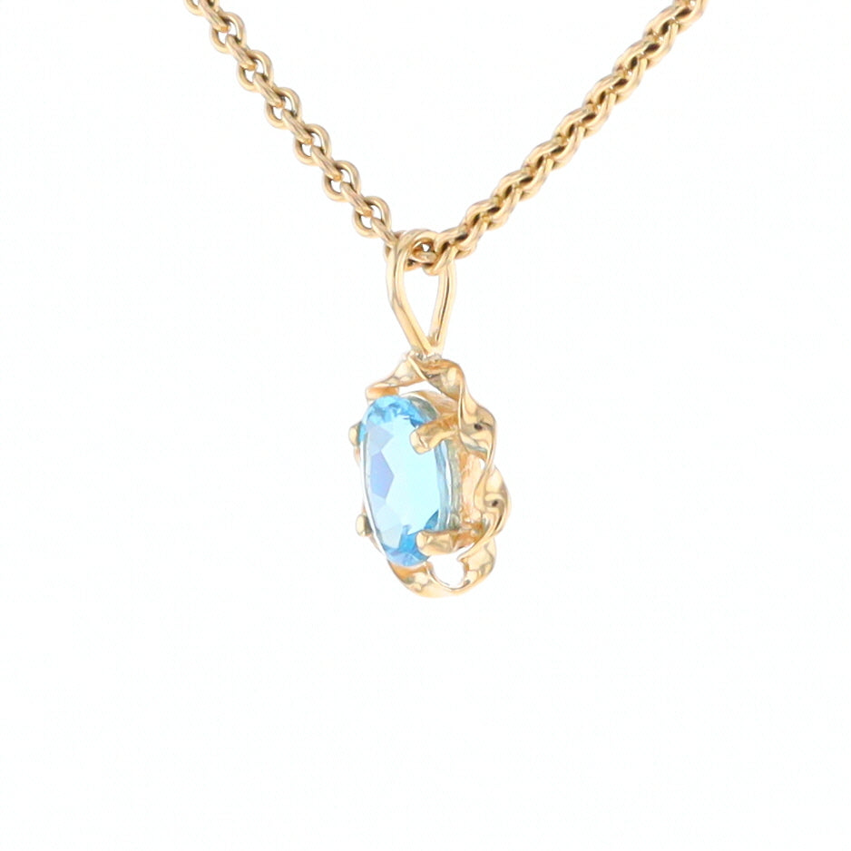 Blue Topaz Twisted Frame Pendant