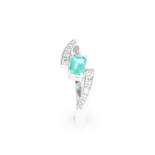 Emerald Twist Ring with Diamond Accents