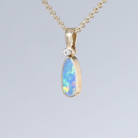 Opal Pendant Oval Inlaid Design with .02ct Round Diamond