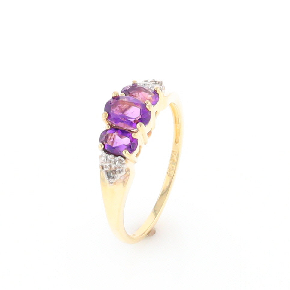 Three stone ring with amethyst