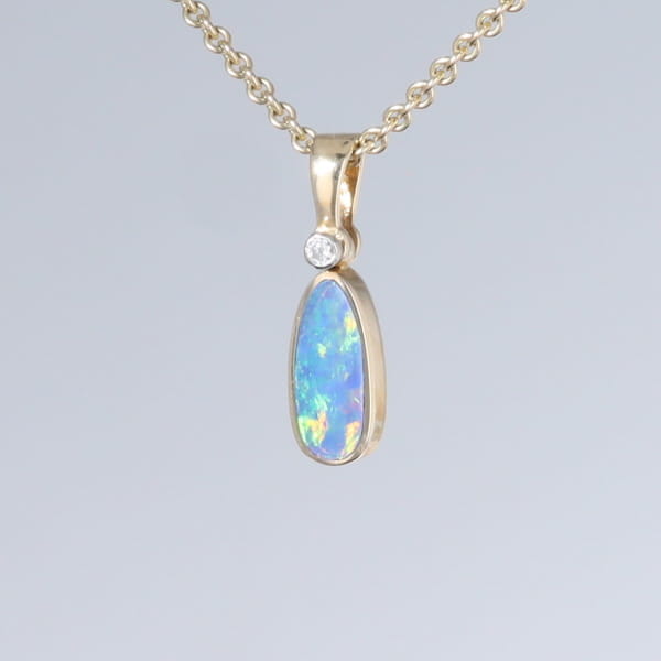 Opal Pendant Oval Inlaid Design with .02ct Round Diamond