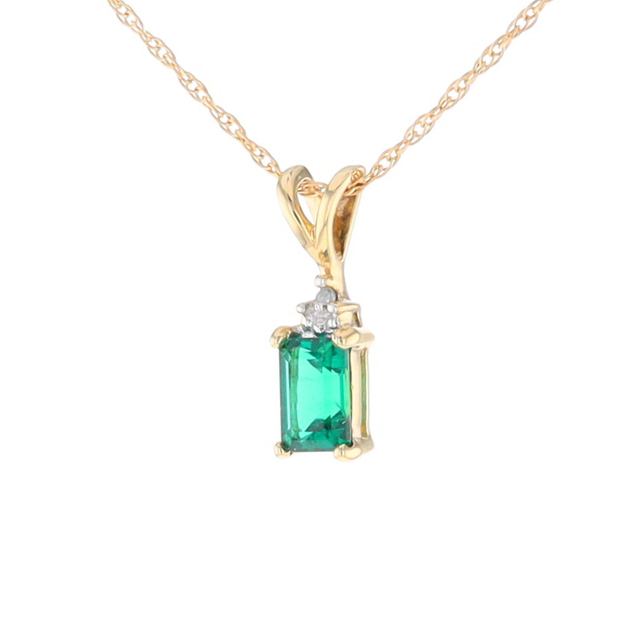 Synthetic Emerald Pendant with Diamond Accents