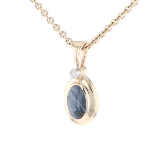 Natural pietersite oval inlaid .02ctw diamond pendant