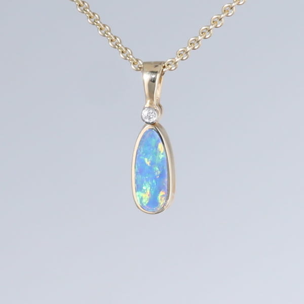 Opal Pendant Oval Inlaid Design with .02ct Round Diamond
