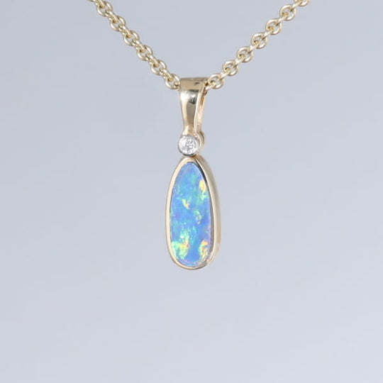 Opal Pendant Oval Inlaid Design with .02ct Round Diamond