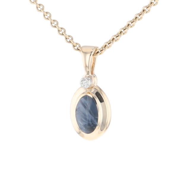 Natural pietersite oval inlaid .02ctw diamond pendant