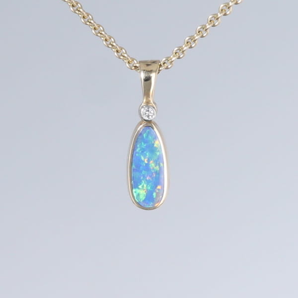 Opal Pendant Oval Inlaid Design with .02ct Round Diamond