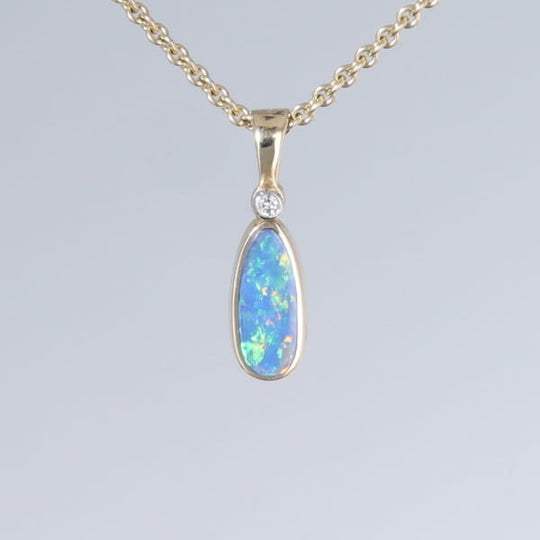 Opal Pendant Oval Inlaid Design with .02ct Round Diamond