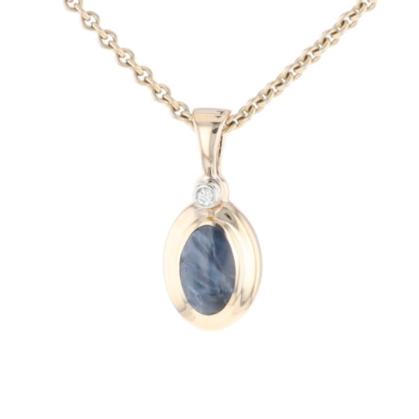 Natural pietersite oval inlaid .02ctw diamond pendant