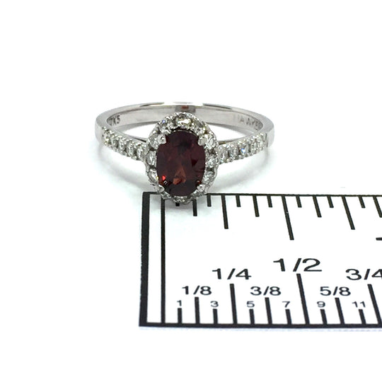 Oval Natural Garnet and .37ctw Round Diamonds Halo Ring