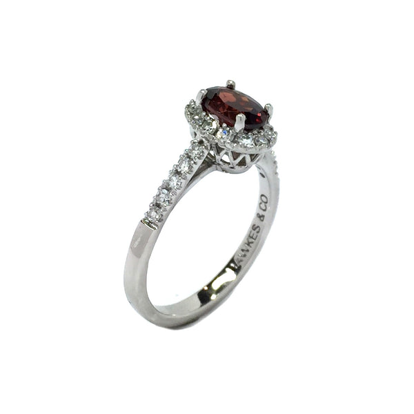 Oval Natural Garnet and .37ctw Round Diamonds Halo Ring