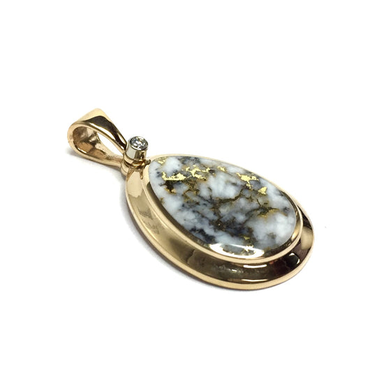 Gold in quartz necklace pear shape inlaid pendant made of 14k yellow gold with a .02ct diamond