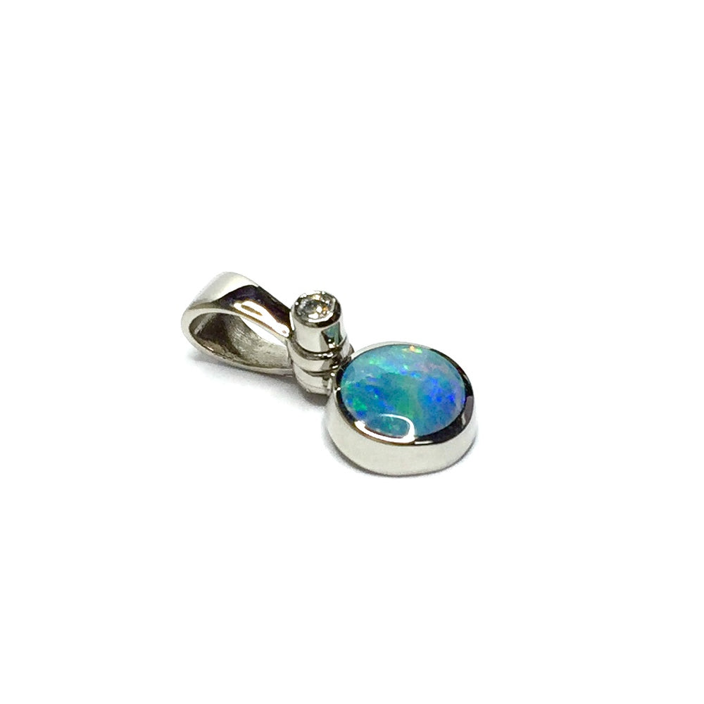 Round Natural Opal Inlay Pendant made of 14k White Gold with a .02ct Diamond